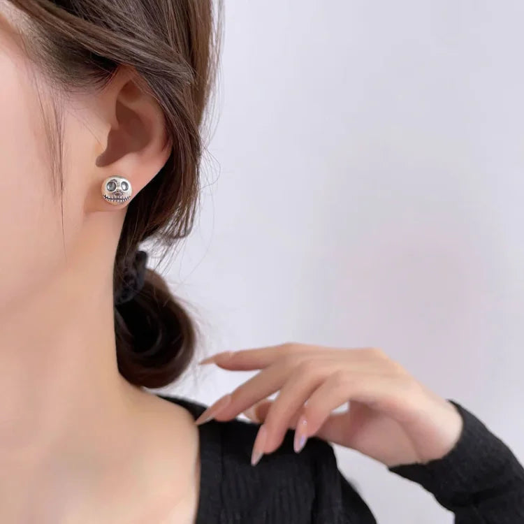 Daring Pumpkin Skull Earrings in Sterling Silver