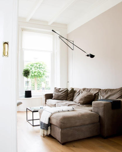Versatile Wall-Mounted Lamp with Flexible Arm and Weight Balance