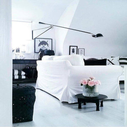 Versatile Wall-Mounted Lamp with Flexible Arm and Weight Balance