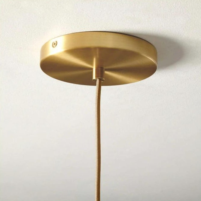 Sleek Sphere Hanging Light with Luxurious Brass Finish
