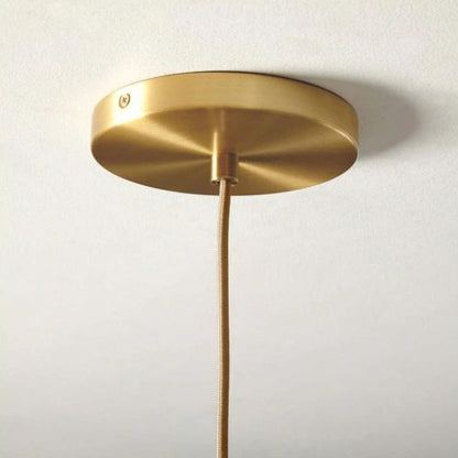 Sleek Sphere Hanging Light with Luxurious Brass Finish