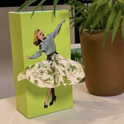 Charming Tissue Dispenser with Flowing Fabric and Secure Base