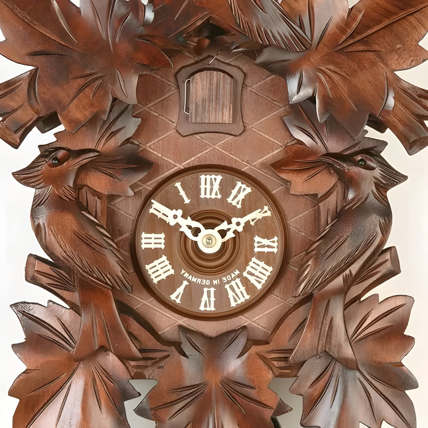 Handcrafted Wooden Wall Clock with Vintage Design and Detailed Carvings