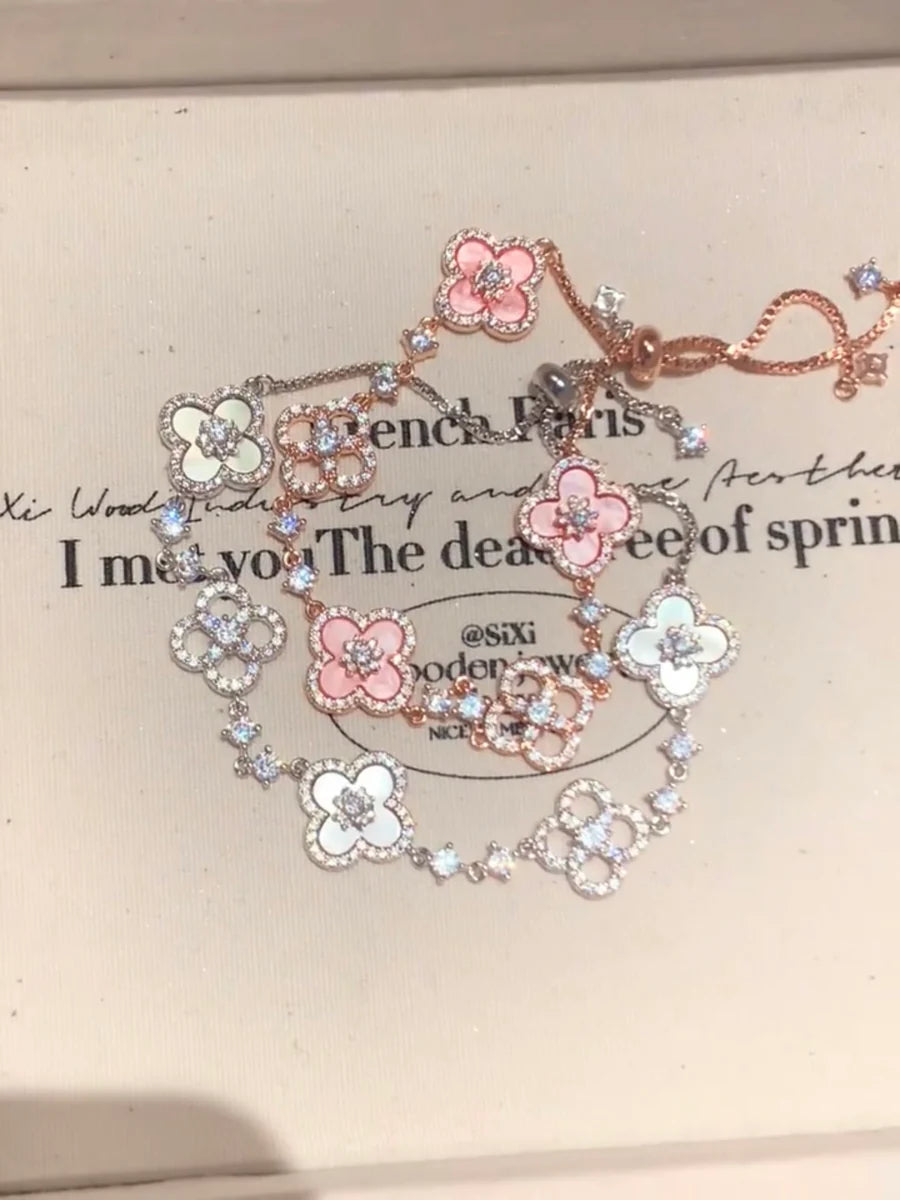 Chic Floral Wristpiece with Natural Shell and Crystal Highlights