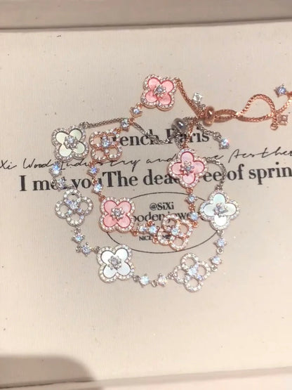 Chic Floral Wristpiece with Natural Shell and Crystal Highlights