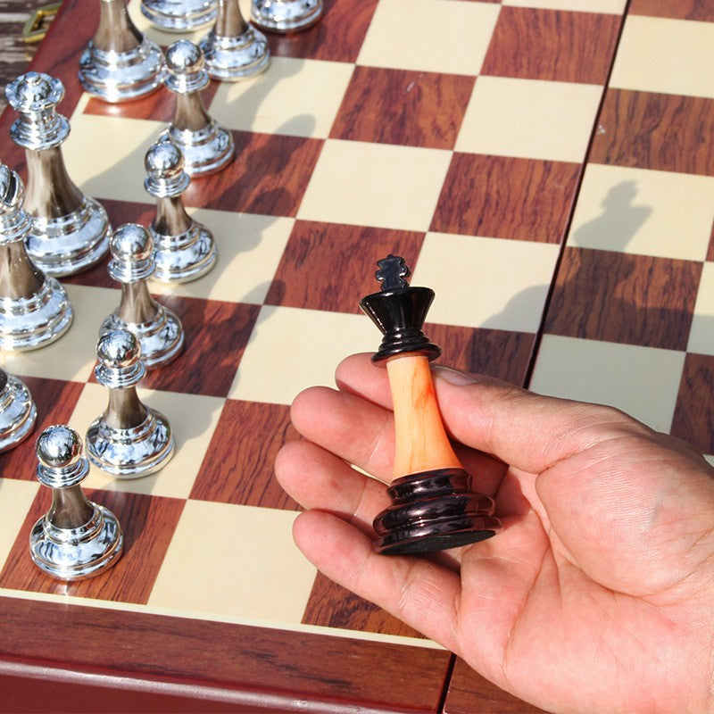 Elegant Metal Chess Collection with Expansive 16.5" Timber Board