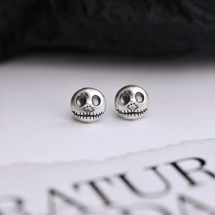 Daring Pumpkin Skull Earrings in Sterling Silver