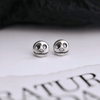 Daring Pumpkin Skull Earrings in Sterling Silver
