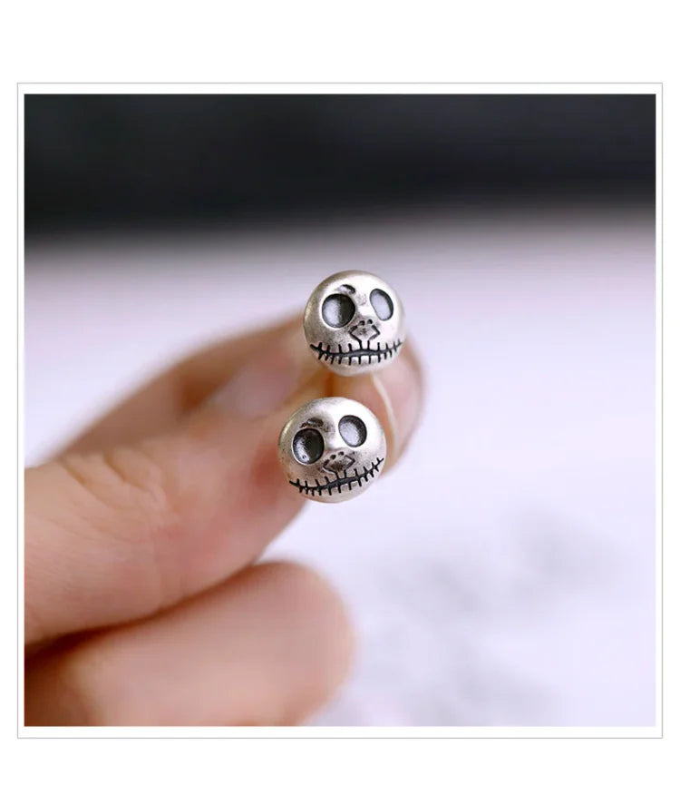 Daring Pumpkin Skull Earrings in Sterling Silver