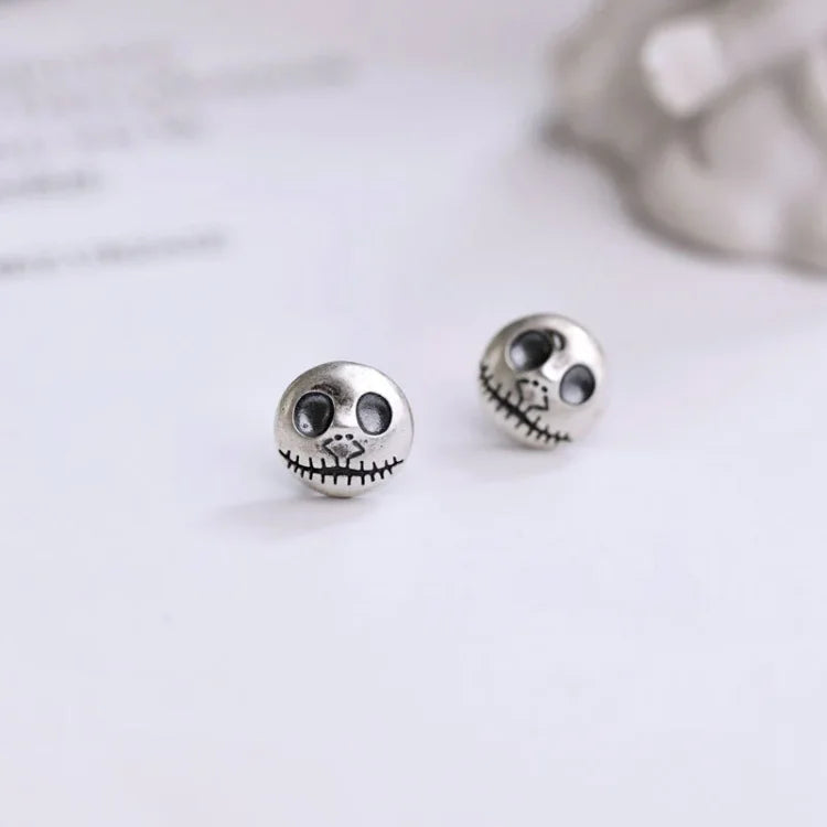 Daring Pumpkin Skull Earrings in Sterling Silver