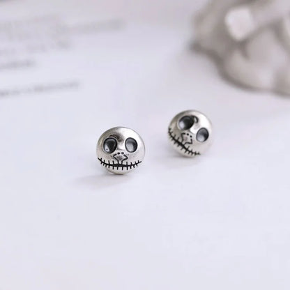 Daring Pumpkin Skull Earrings in Sterling Silver