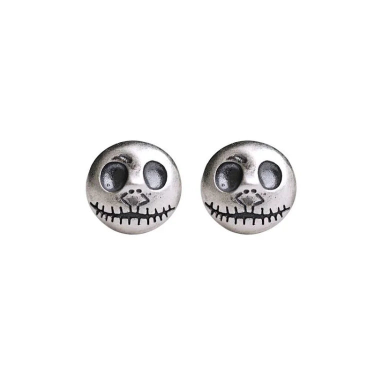 Daring Pumpkin Skull Earrings in Sterling Silver
