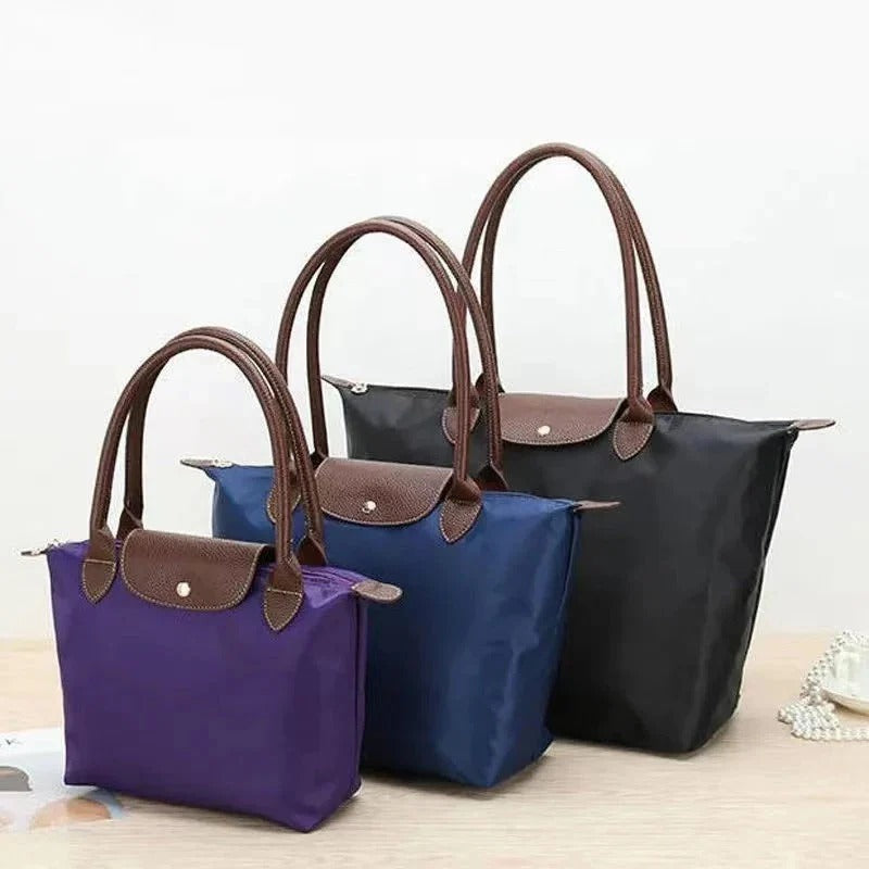 Elegant Top-Handle Handbag with Ample Space and Classic Style