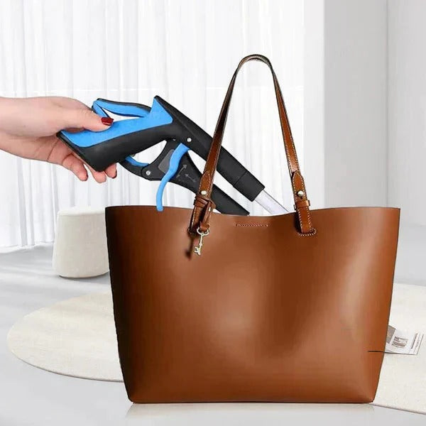 Versatile Reaching Aid with 360-Degree Rotating Head and Comfortable Grip