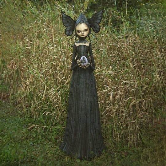 Enchanting Witch Figurine for Spooky Season Decor