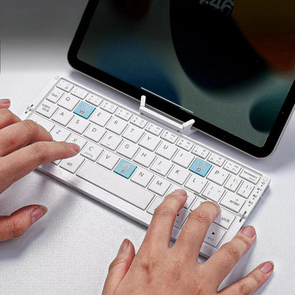 Compact Wireless Keyboard with Magnetic Tablet Holder