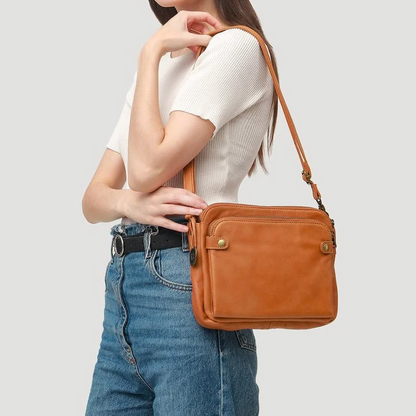Elegant Leather Crossbody Bag with Versatile Straps and Card Holders