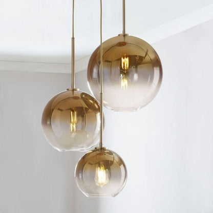 Sleek Sphere Hanging Light with Luxurious Brass Finish