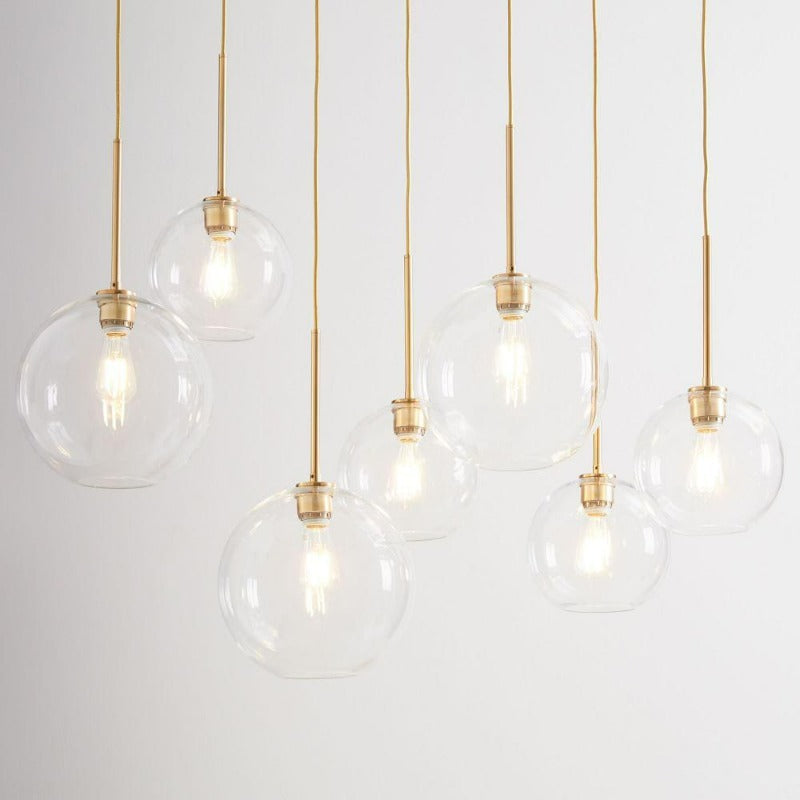 Sleek Sphere Hanging Light with Luxurious Brass Finish