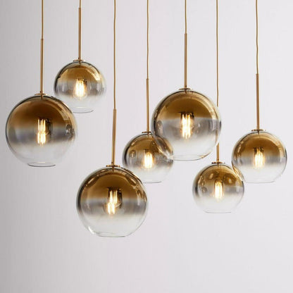 Sleek Sphere Hanging Light with Luxurious Brass Finish