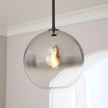 Sleek Sphere Hanging Light with Luxurious Brass Finish