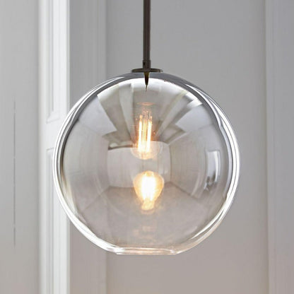 Sleek Sphere Hanging Light with Luxurious Brass Finish