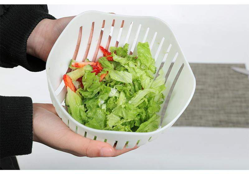 Effortless Salad Slicer with Safety Features and Compact Design