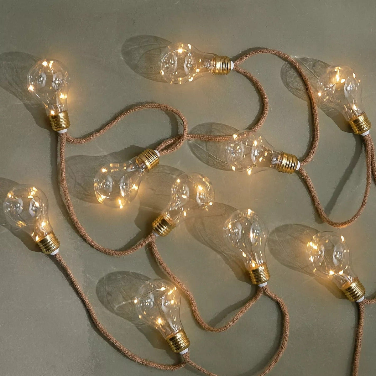 Warm LED String Lights with Rope Design for Outdoor Use