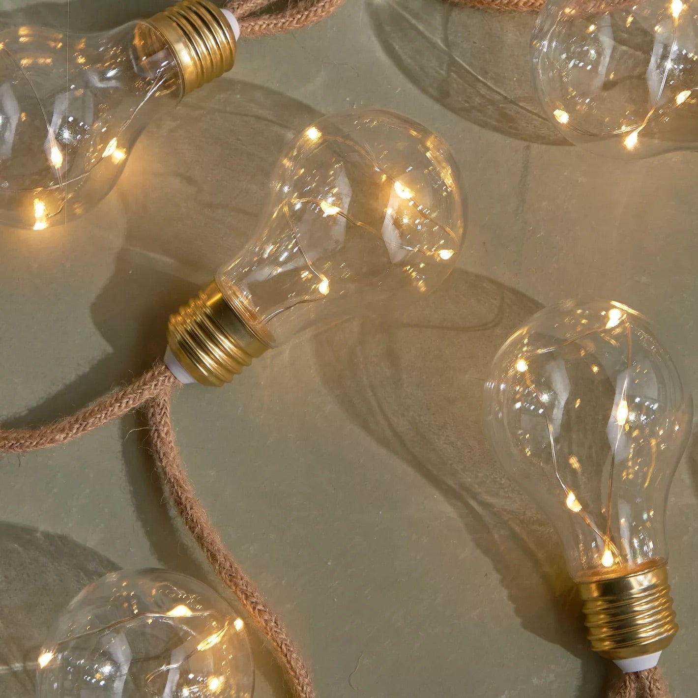 Warm LED String Lights with Rope Design for Outdoor Use